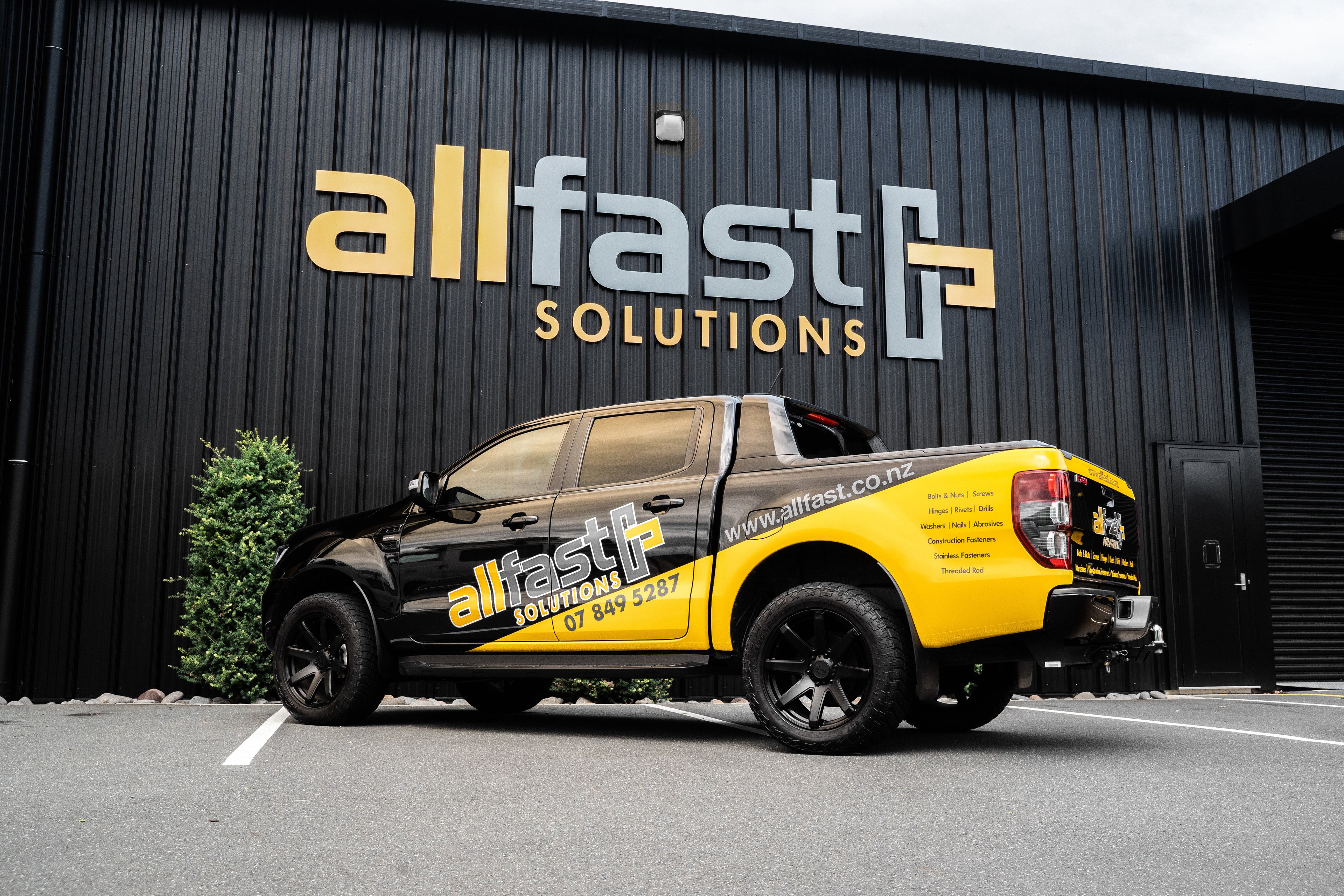 Allfast Auckland Ute parked outside building